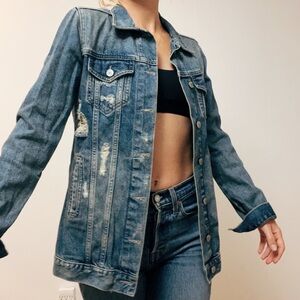 Distressed denim jacket